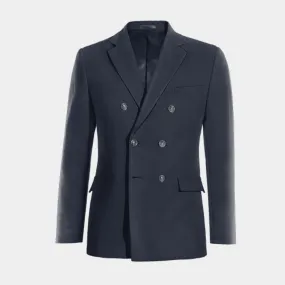 Navy blue mid-season double-breasted blazer.