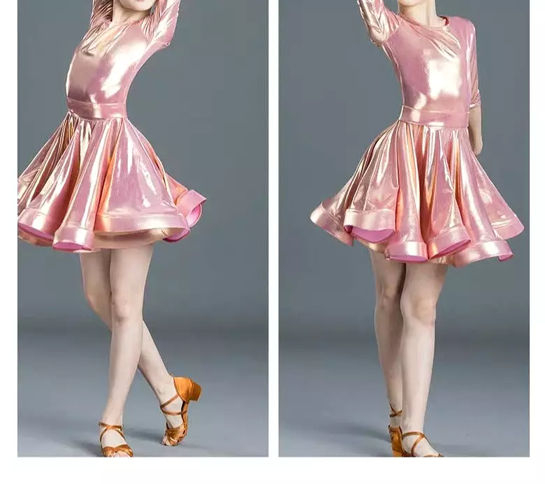 Practice or competition shiny pink latin dress with half sleeves and removable belt in stock.