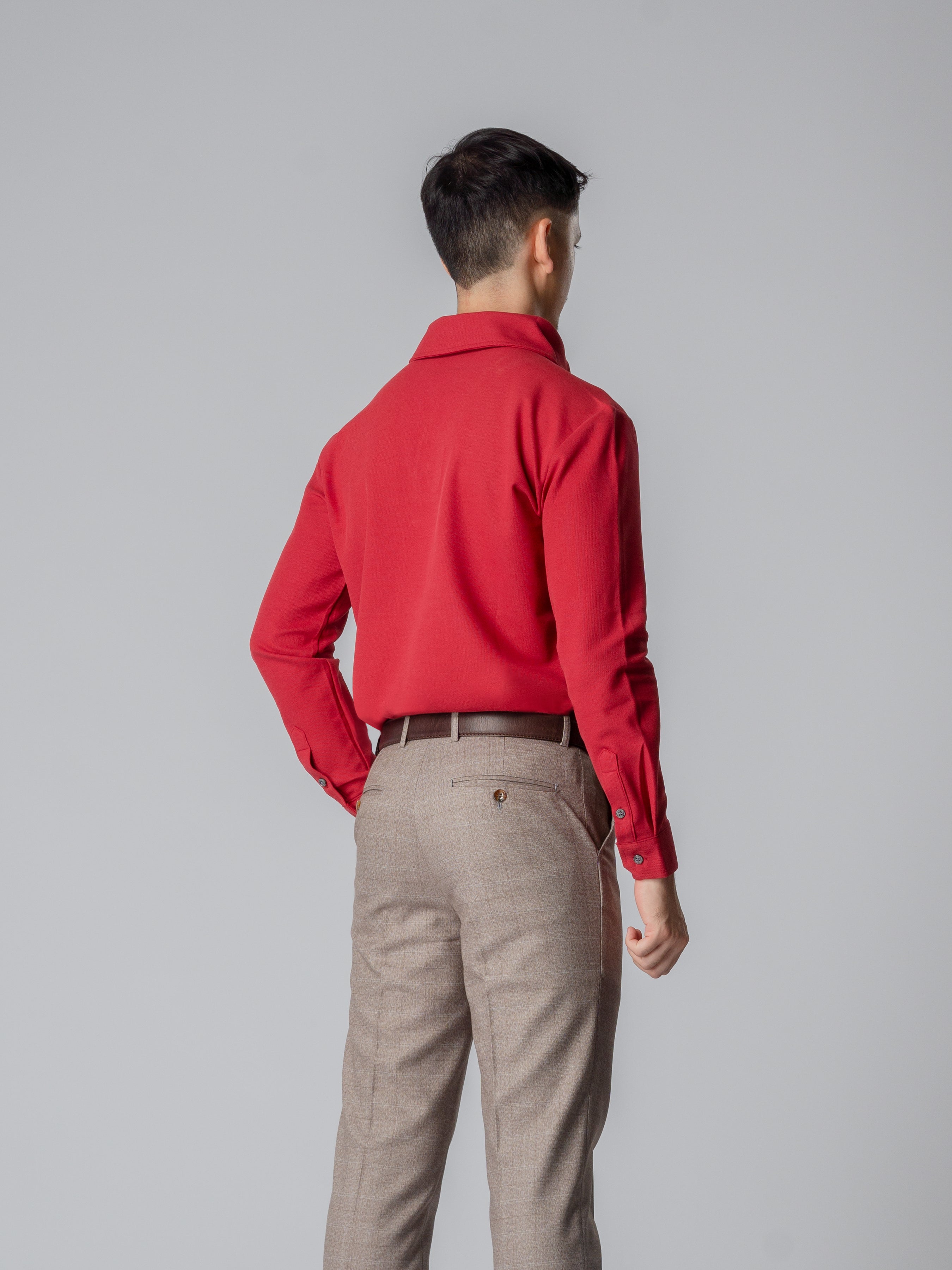 Red long sleeve polo shirt with one-piece collar and single button.