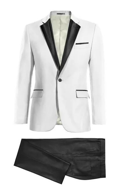 White broken blazer with essential black lapel and black pants.